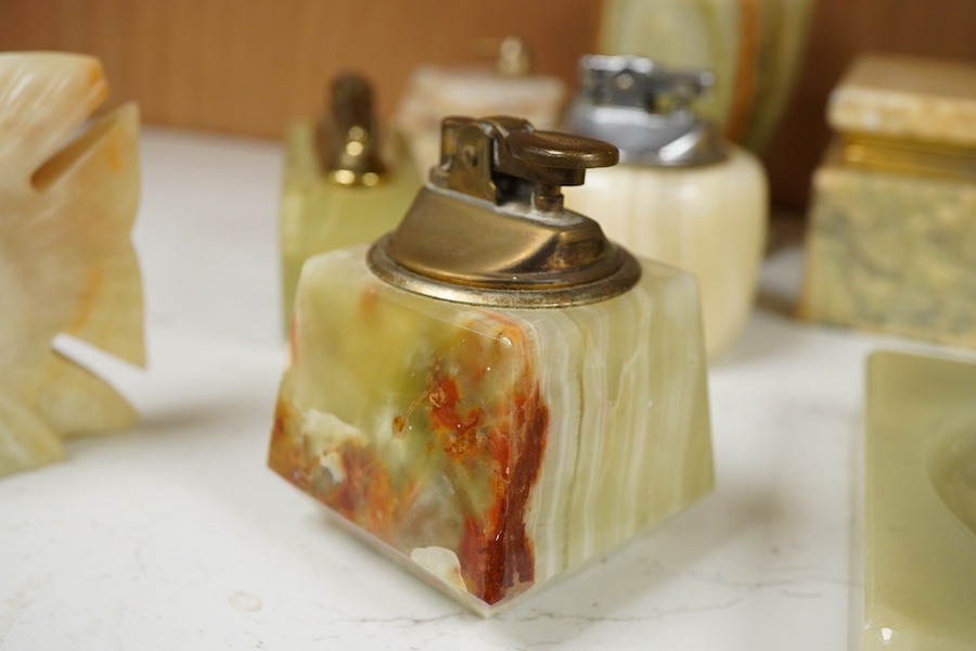 A collection of various onyx collectables to include boxes, vases and table lighters, largest 23cm high